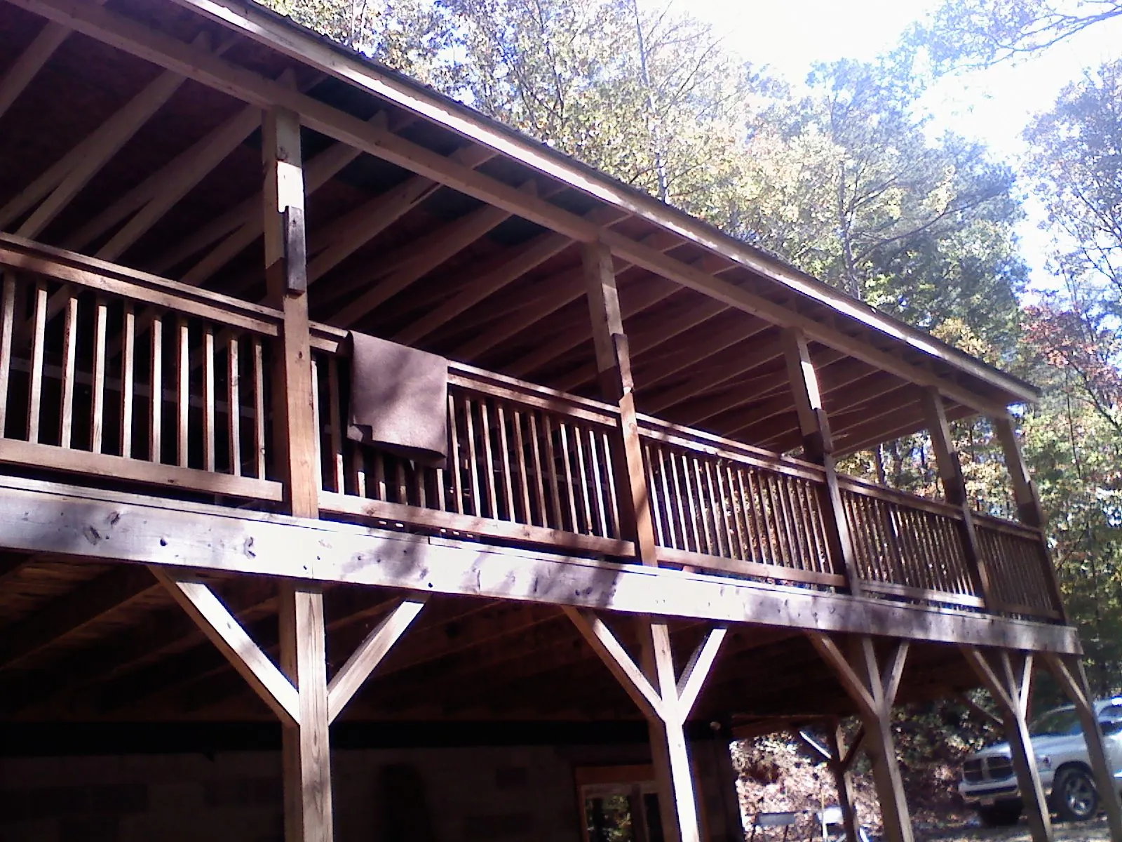 Timber framing under a new elevated porch and deck — Roof Leak Repair in Sadsburyville by Roofing Brothers